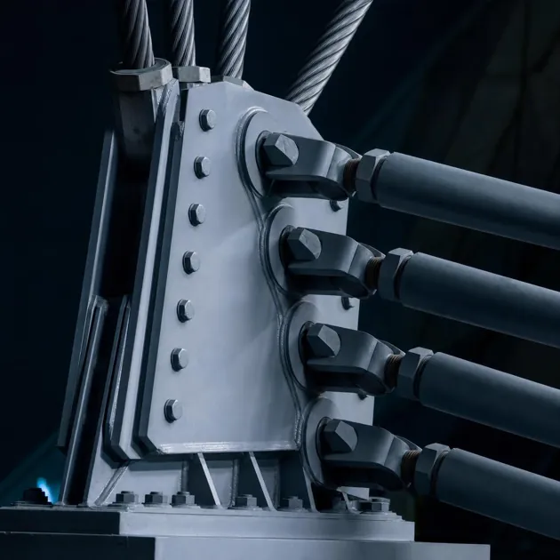 Macro close-up of precision steel structural joints under dramatic raking light, showing load-bearing engineering that cannot fail